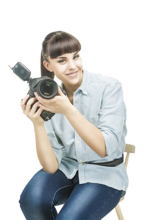Female Photographer Holding A Camera And Smiling Stock Photo Image Of