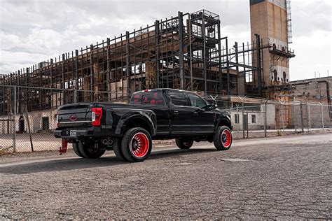Anger Management Black Lifted Ford F 350 Boasting Red Accents — Carid