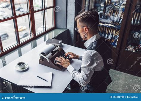 Young Writer Typing On A Retro Typewriter Stock Photo Image Of Writer