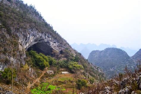 The Giant Cave In China With 100 People Living Inside