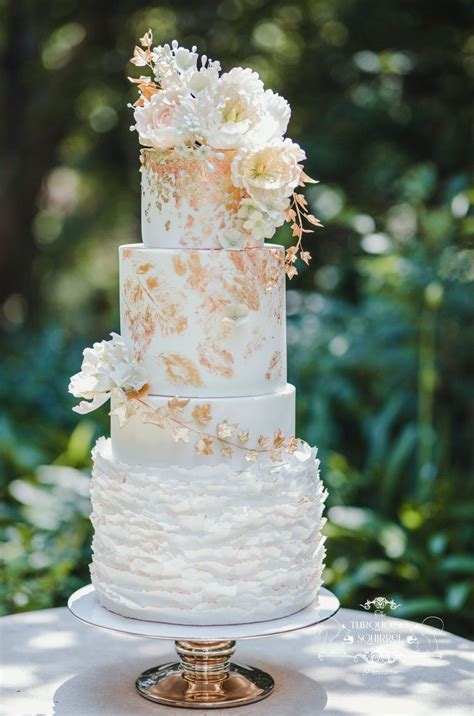 In some parts of england, the wedding cake is served at a wedding breakfast; Elegant yet playful white and gold wedding cake, with rose gold accents, with sugar flower ...