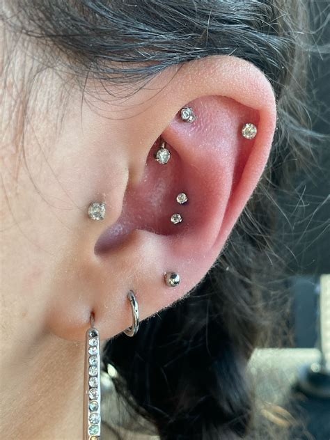 Rook Double Conch Helix Triple Lobe And Tragus Piercings Types Of