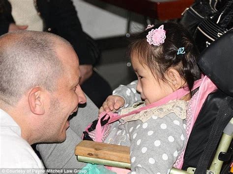 Dallas Couple Sue After Adopting Chinese Girl With Spina Bifida Daily Mail Online