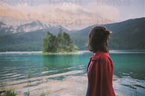 Germany Bavaria Eibsee Young Woman Standing At By Eibsee Lake In