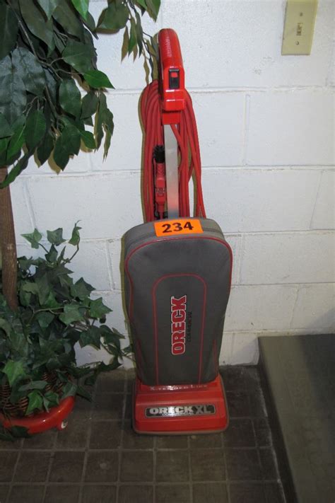 Oreck Xl Upright Commercial Vacuum Cleaner And Tall Faux Plant