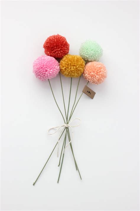 Maybe you would like to learn more about one of these? mini yarn pom pom flowers bouquet 5 poms