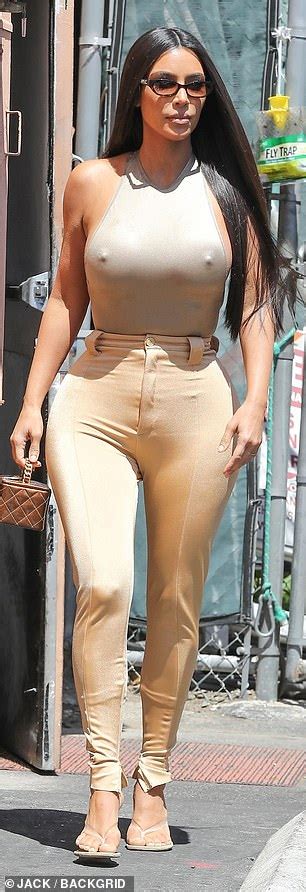kim kardashian goes braless in a bold bodysuit and recycled skirt for an errand run in la 24h