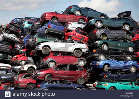 Your location could not be automatically detected. Disused cars pile at a car recycling centre near ...