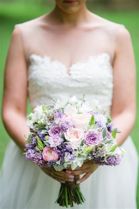 A Romantic Spring Bridal Bouquet In Purple And Pink Chic