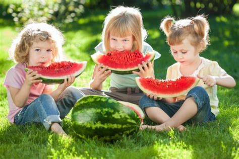 Children Eating Watermelon In Summer Stock Photo Free Download