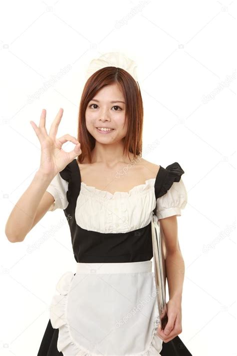 Young Japanese Woman Wearing French Maid Costume Showing Perfect Sign