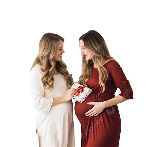 Young Pregnant Mother And Child Celebrating Christmas At Home