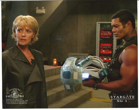Stargate Sg 1 Amanda Tapping With Christopher Judge Holding Weapon 8 X 10 Photo At Amazons
