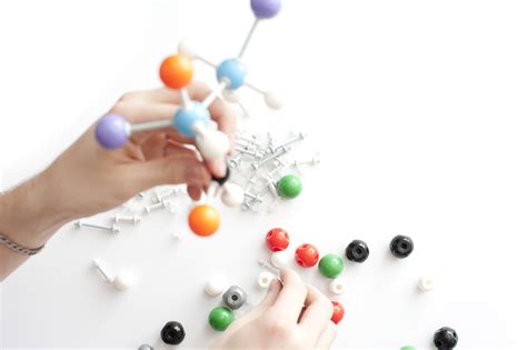 Free Stock Image Of Man Building A Science Molecular Model