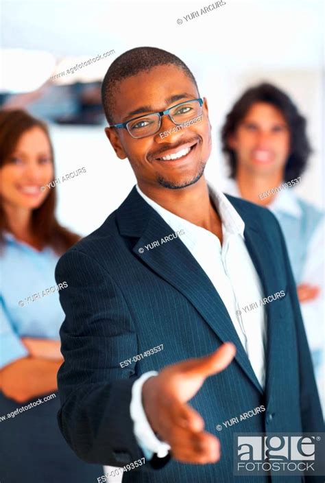 African American Business Man Offering You Handshake With Multi Ethnic