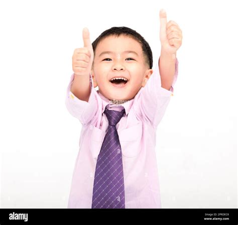 Happy Boy In A Suit And Showing Thumbs Up Isolated On White Background