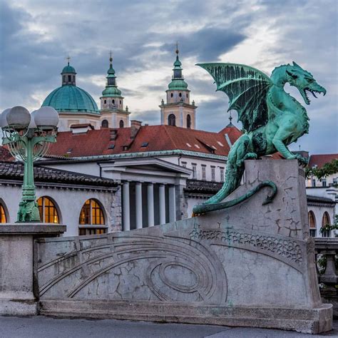 four large dragons guard ljubljana s dragon bridge in the capital of slovenia with two at each