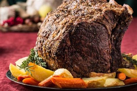 Prime rib roast with vegetable puree. Herb-Crusted Beef Rib Roast with Potatoes, Carrots, and ...