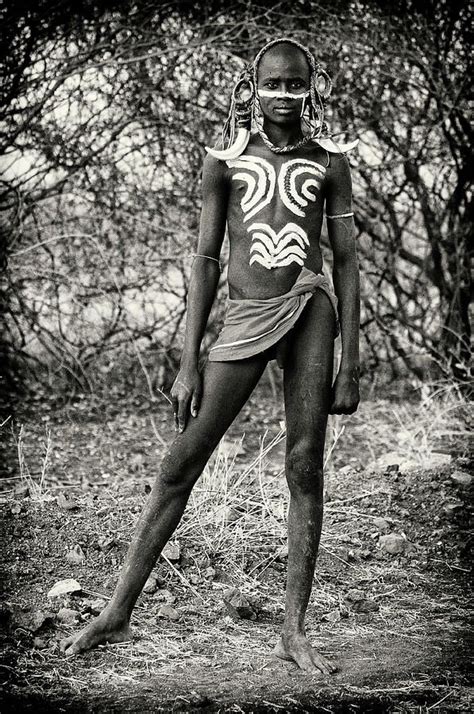 Pin By On Mursi Tribe Tribal Men African People
