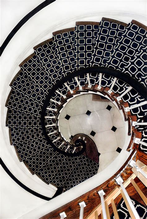 Incredible Black And White Tiled Spiral Staircase Foyers Stairways