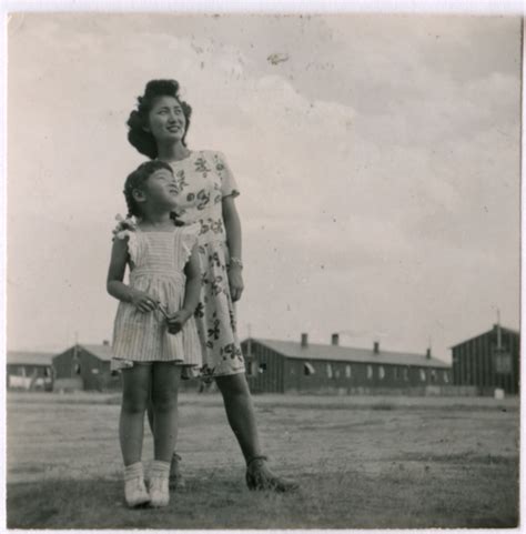 ddr densho 362 4 — a japanese american woman and girl look up into the sky densho digital