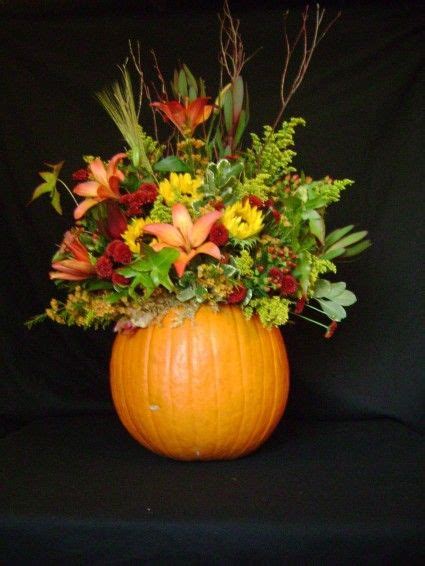 Flower Arrangement In A Pumpkin Perfect For Thanksgiving Or Christmas