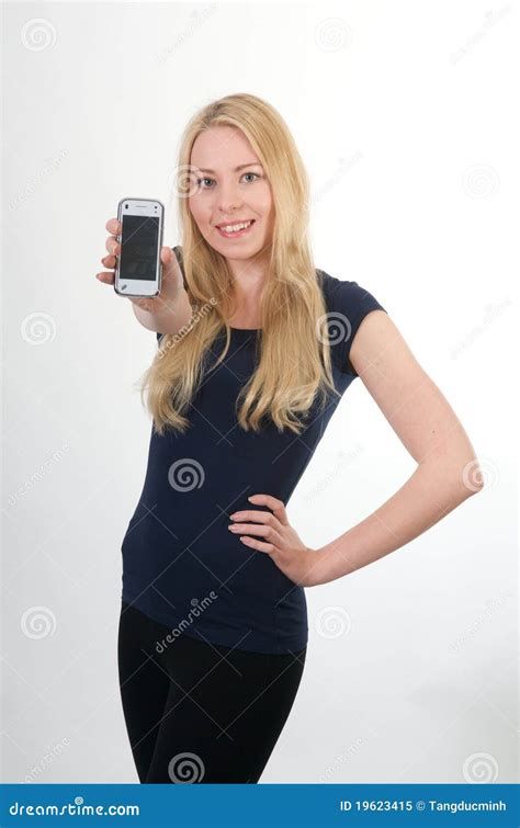 blond smiling girl showing mobile phone stock image image of smiling beautiful 19623415