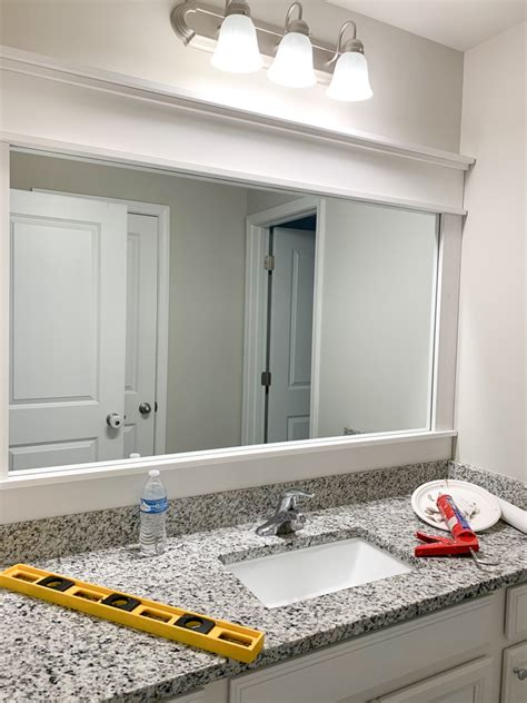 Diy How To Frame A Builder Grade Bathroom Mirror Home And Hallow Madame Lelica