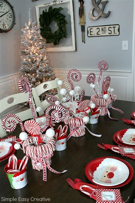 All you need are green craft paper and fun red jingle. Christmas Table Centerpieces - Hoosier Homemade