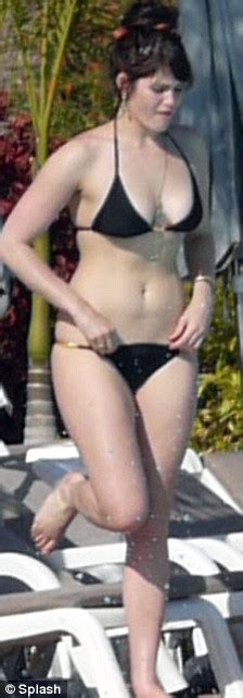 Bond Girl Gemma Arterton Puts Her Shapely Figure On Show In A String