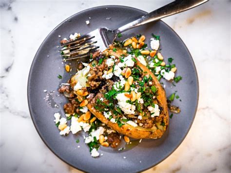Page contents recipe courtesy emeril lagasse, 2001. Roasted Sweet Potatoes Topped with Spiced Ground Beef and Pine Nuts Recipe | Elena Besser | Food ...