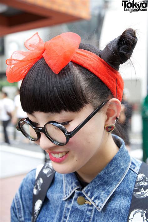 harajuku high school girl in sheer skirt nadia platform converse and double bun hairstyle tokyo