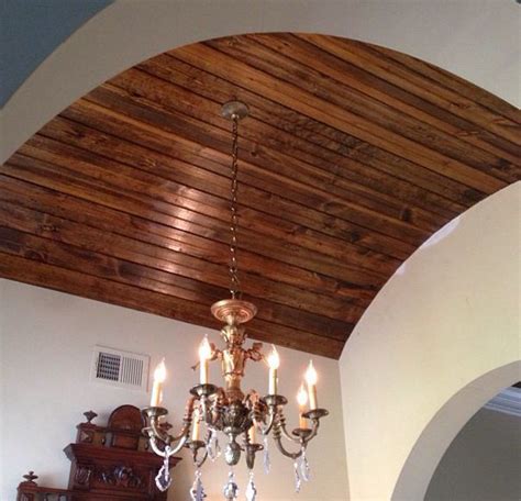 Vaulted ceilings can make a room look much larger, giving it a light and lofty appearance. Arched ceiling with stained tongue & groove wood. My hubby ...