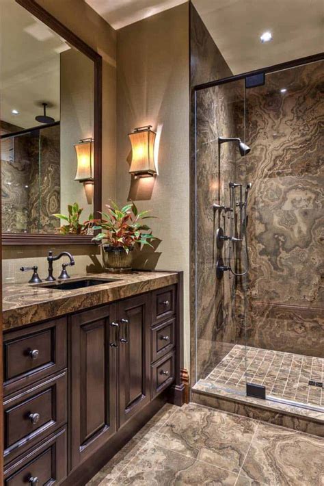 A Bathroom With A Walk In Shower Next To A Double Sink Vanity And Large Mirror