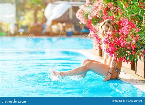 Young Beautiful Blond Woman Resting In The Swimming Pool Stock Image Image Of Season Heat