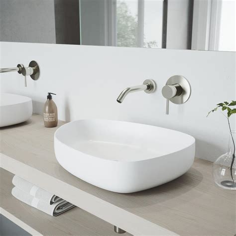 Corner sinks for tight quarters along with irregular, oval, rectangular, round and square shapes augment the scope of. VIGO Peony Matte Stone Vessel Sink in White with Olus Wall ...