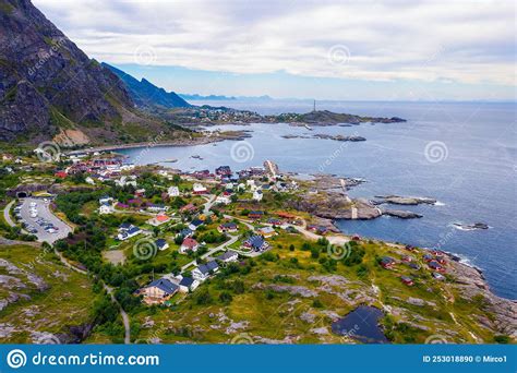Reine Fishing Village Surrounded By High Mountains And Fjords On