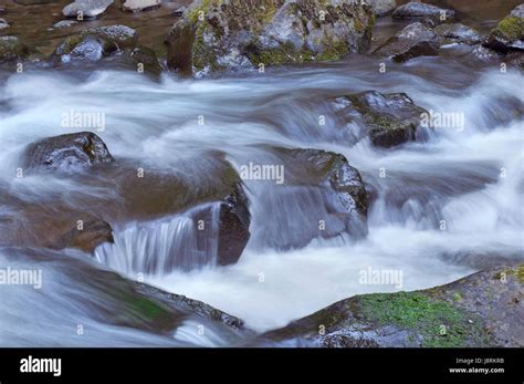 Rushing River Water Flowing Over Rocks In Lebanon Oregon Stock Photo