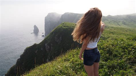 A Girl Standing On The Edge Of A Cliff Girl Standing Picture Perfect