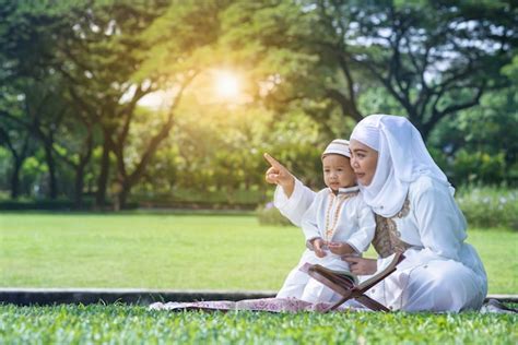 Asian Muslim Mother And Her Son Enjoying Quality Time At Park Muslim