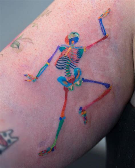 Colorful Skeleton Tattoo Done On The Inner Forearm