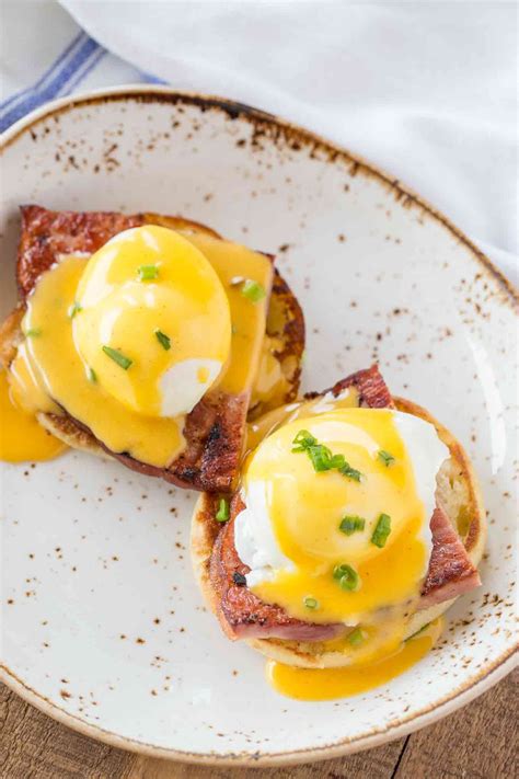 perfectly easy eggs benedict made with a foolproof vinegar free poaching method with luxurious