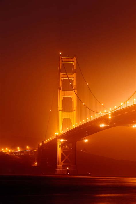 Download Beautiful San Francisco Skyline Cloaked In Fog Wallpaper