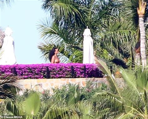 rihanna showcases her ample cleavage in tiny gold bikini during sun soaked mexico break photos