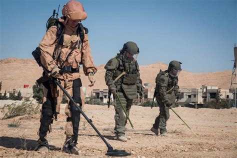 Russian Sappers In Palmyra Syria Using Passive Exoskeletons The