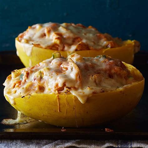 Join me in devouring one of my favorite healthy recipes out there. Chicken Enchilada-Stuffed Spaghetti Squash Recipe - EatingWell
