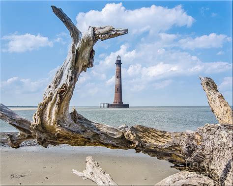 Lighthouse At Folly Beach Photograph By Mike Covington Pixels