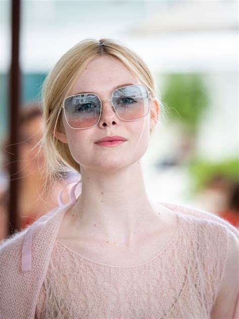 elle fanning just served up the chicest—and easiest—summer hair trick in cannes elle fanning
