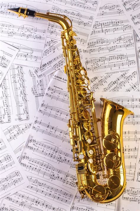 Saxophone Against A Background Of Sheet Music Stock Image Image Of Alto Music 170451203