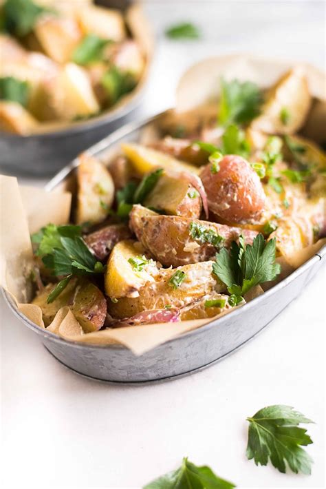 Place potatoes, bell peppers and onion in a large bowl and drizzle with olive oil, then season with salt, pepper, dill, cumin and chili powder. Roasted Potato Salad • A Sweet Pea Chef